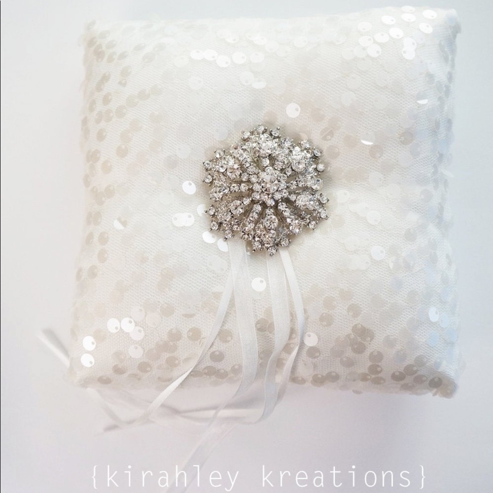 Snowflake brooch ring bearer pillow with blue ribbon